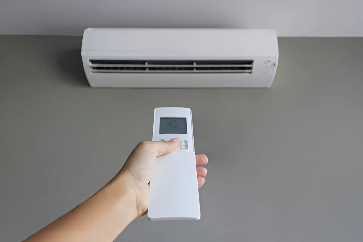 Home 9 Certified technician providing air conditioning service at a residential property in Orlando